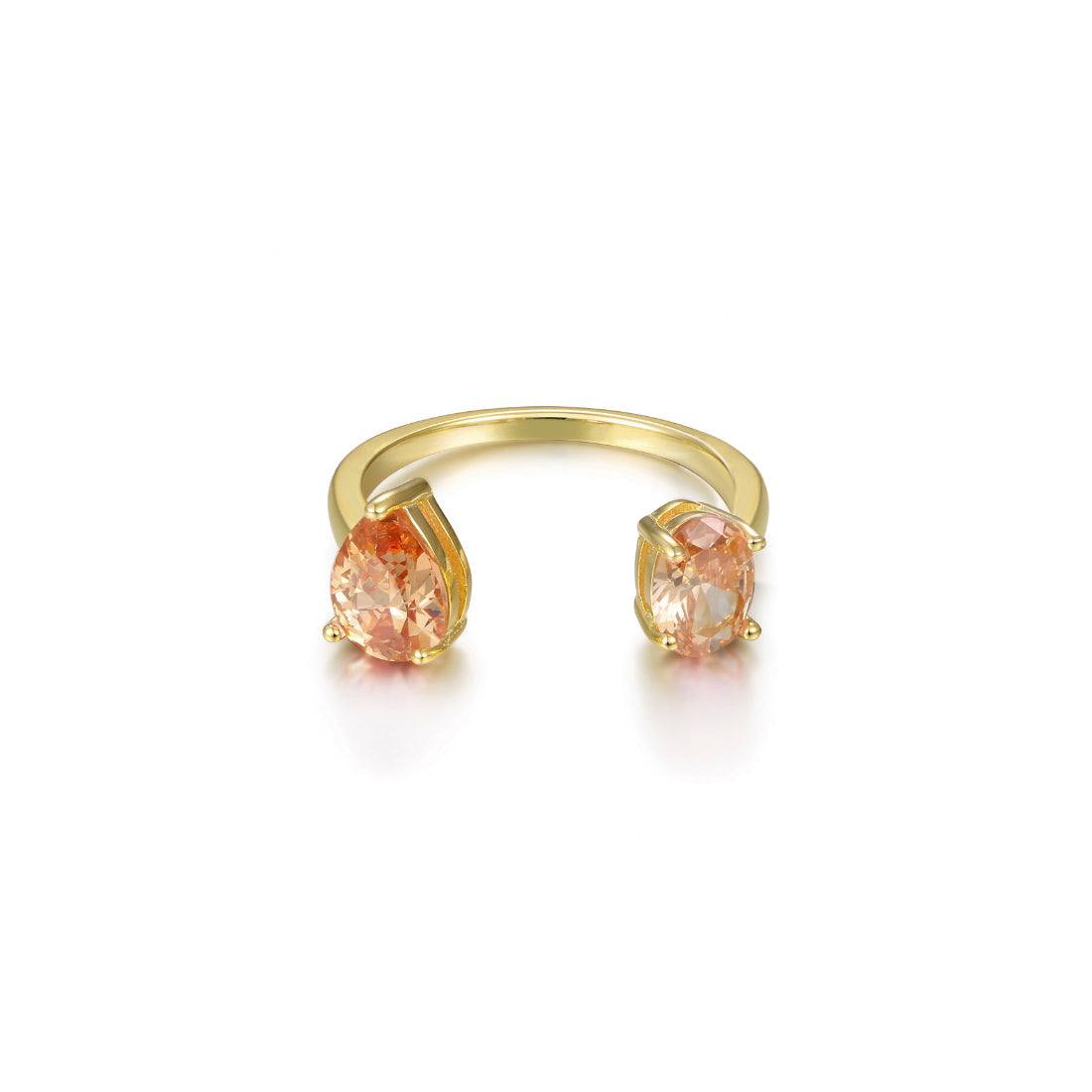 Sibela Studio anillo abierto dos piedras una en talla perra y otra en talla oval sujetas por garras en color naranja un anillo atemporal y divertido, realizado en plata de 1ª ley 925 milésimas y acabado con un baño de oro amarillo. 